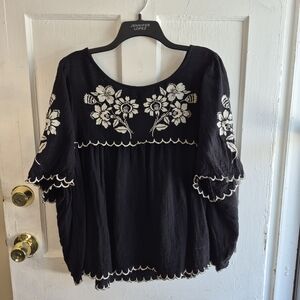 Jennifer Lopez Black Top with White Floral Embroidery